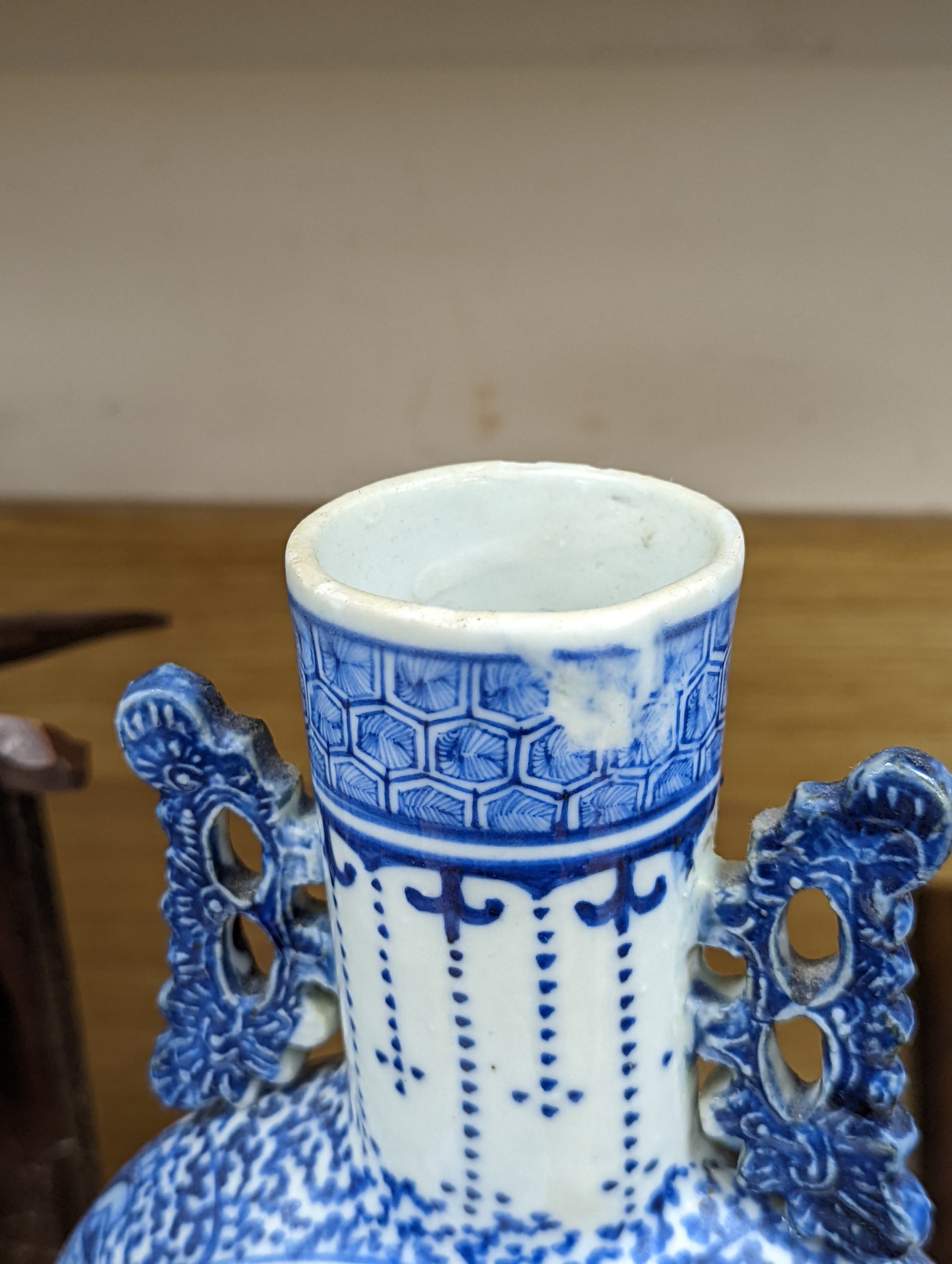 Three 19th century Chinese blue and white Moon flasks, tallest 31 cms.